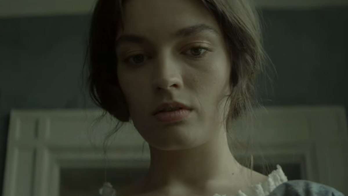 Emma Mackey como Emily Brontë
