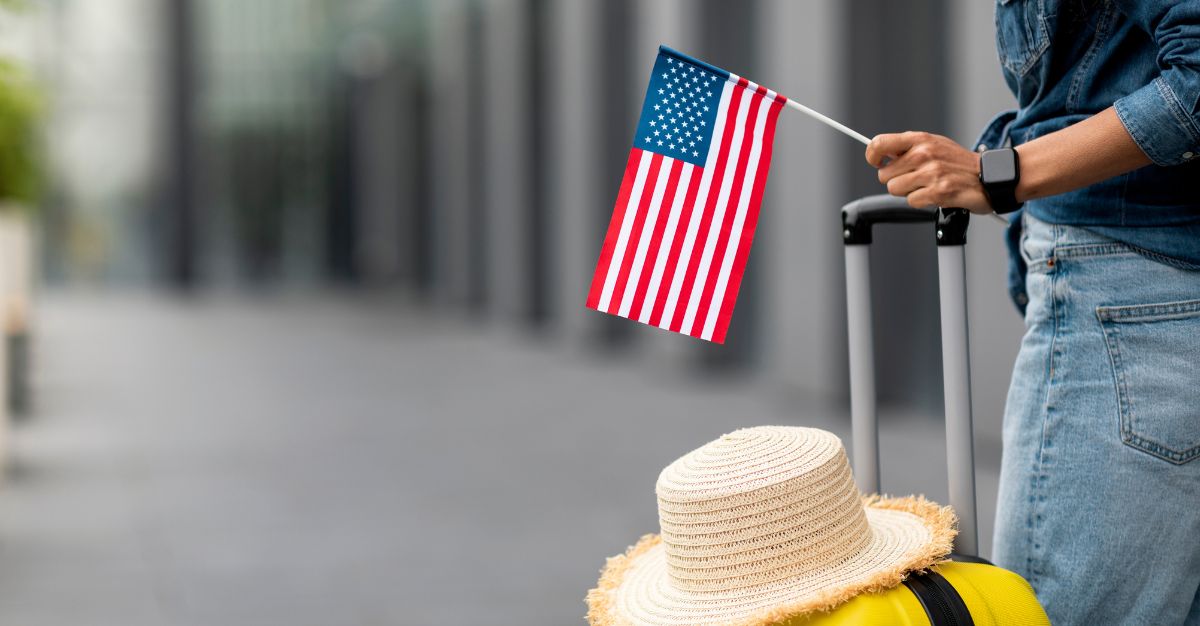 Turista con bandera de Estados Unidos
